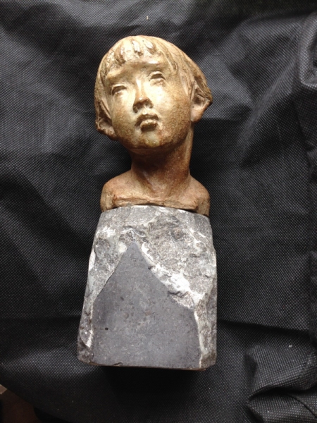 Children's head - Bronze and stone